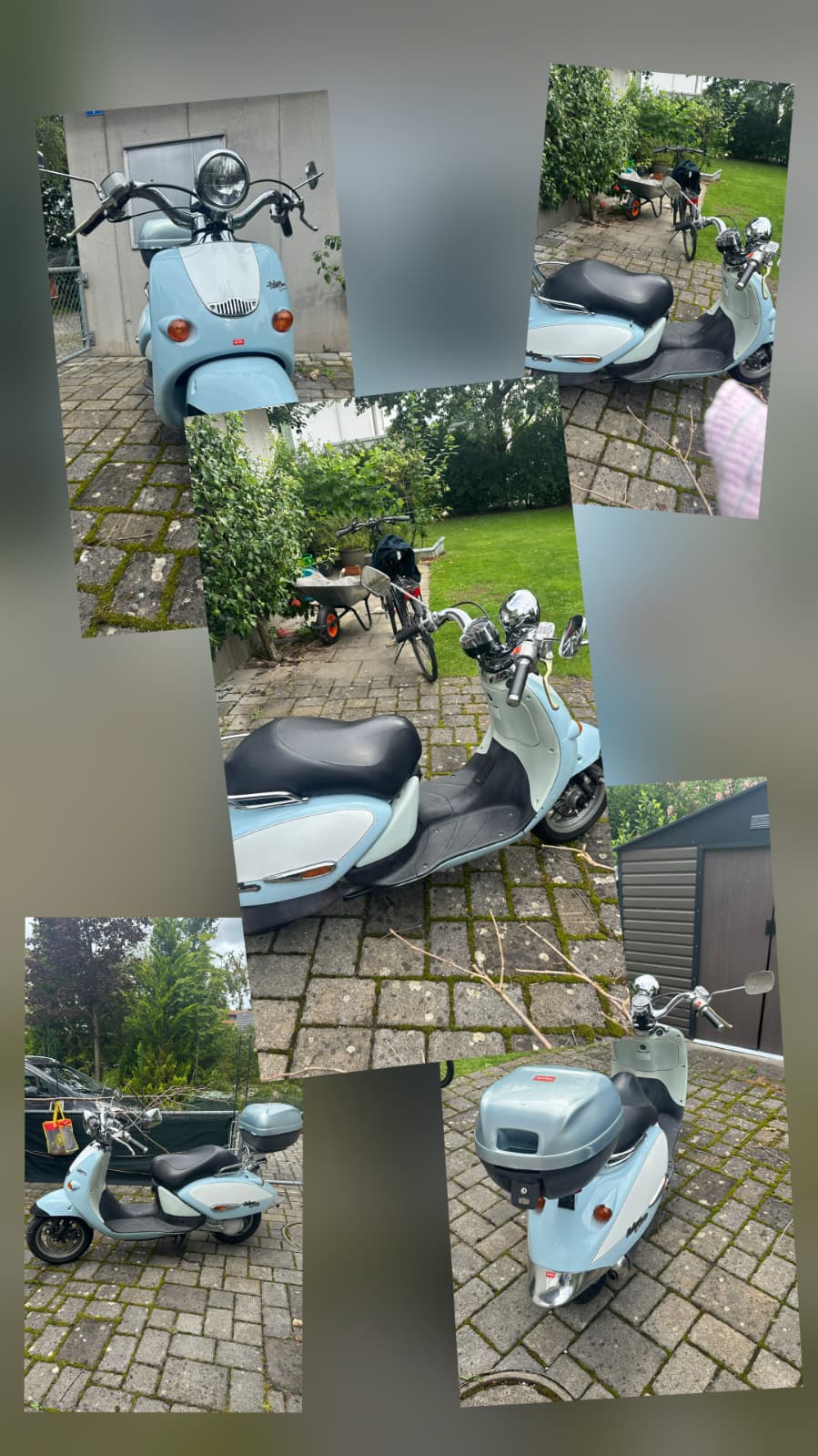 Hellblauer Roller,mit Kleinem Helmkoffer